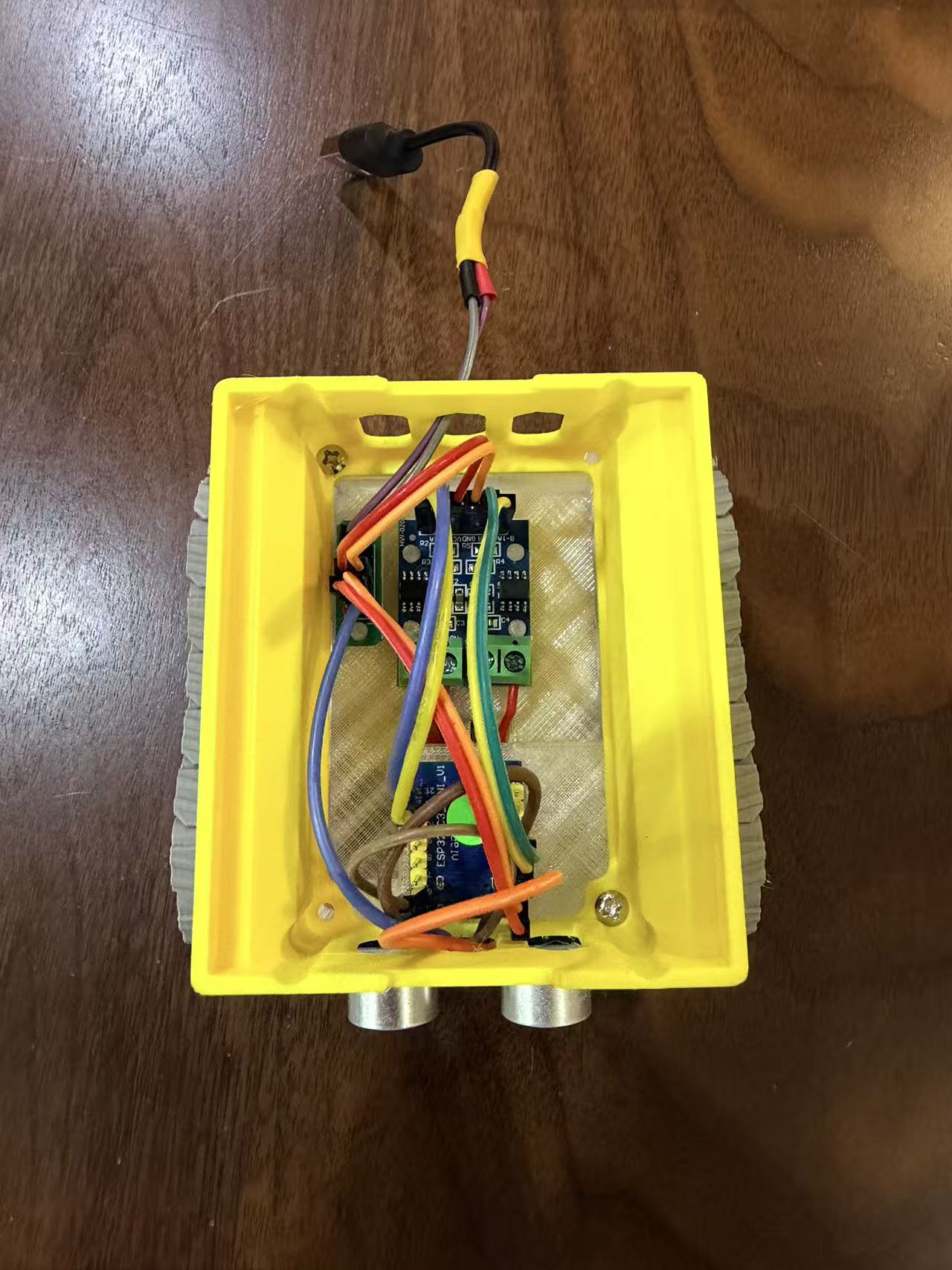 Installing second body cover and battery holder